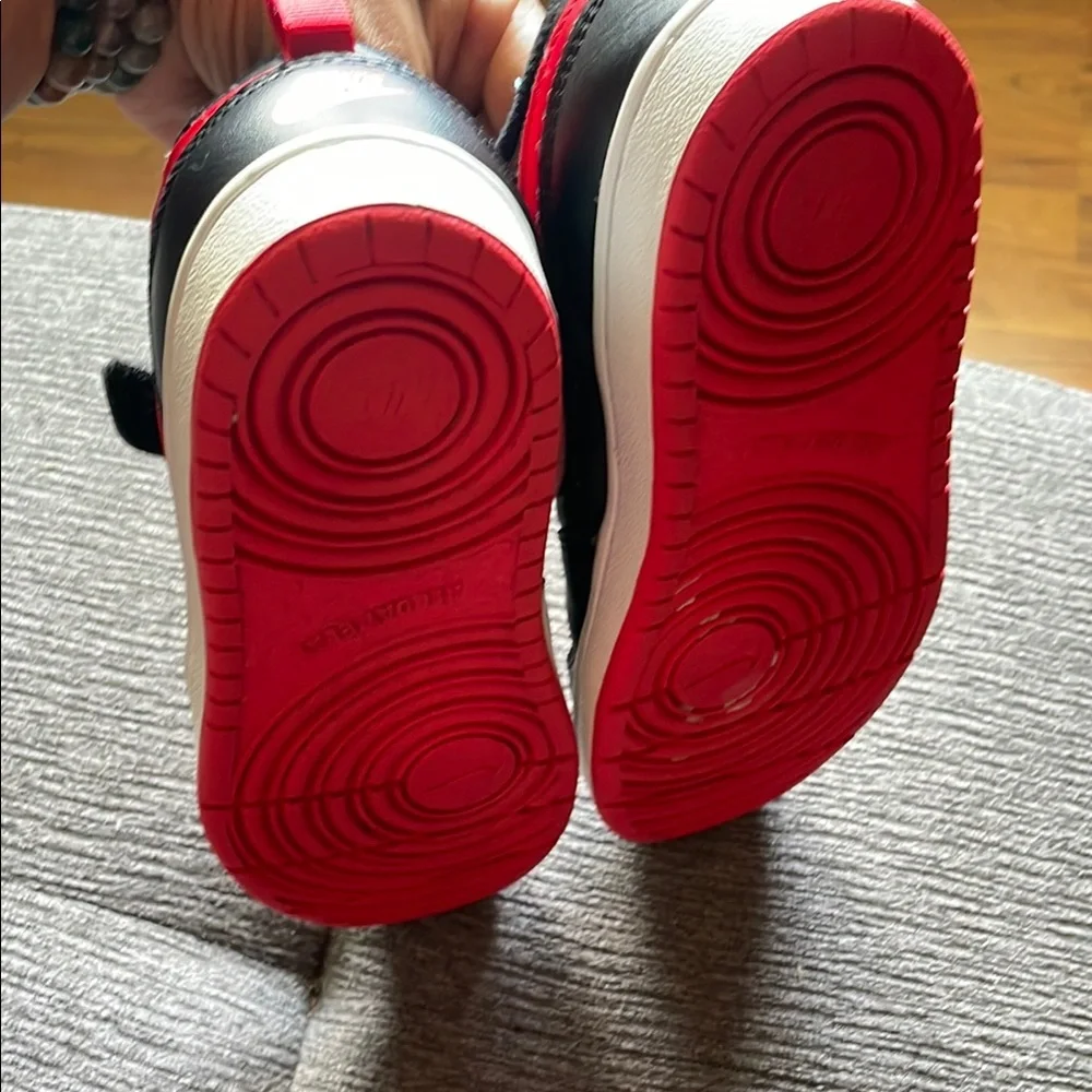 Nike Red and Black Sneakers with Classic Style